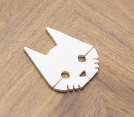 Stray hand made and painted logo badge/magnet.