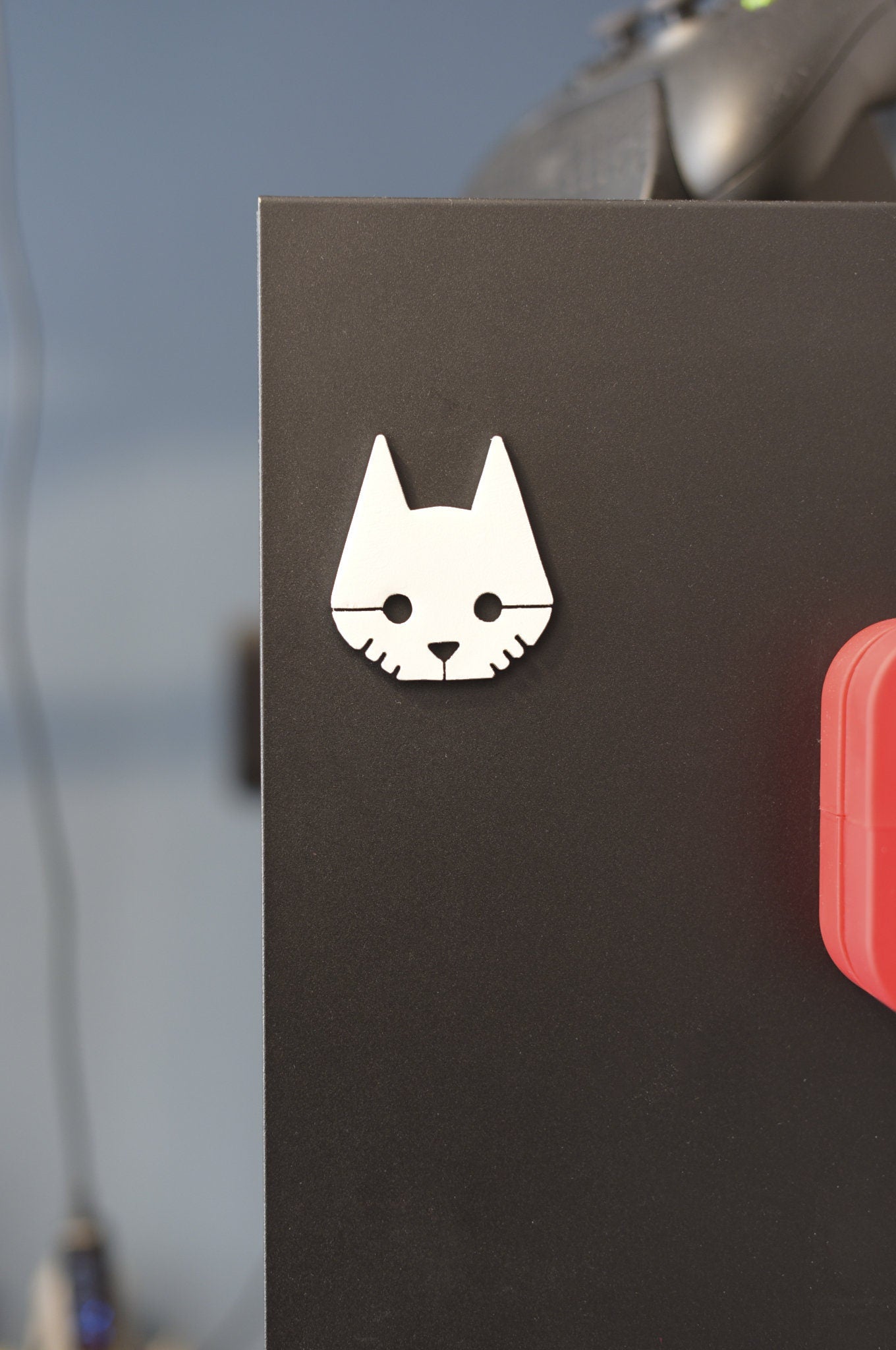 Stray hand made and painted logo badge/magnet.