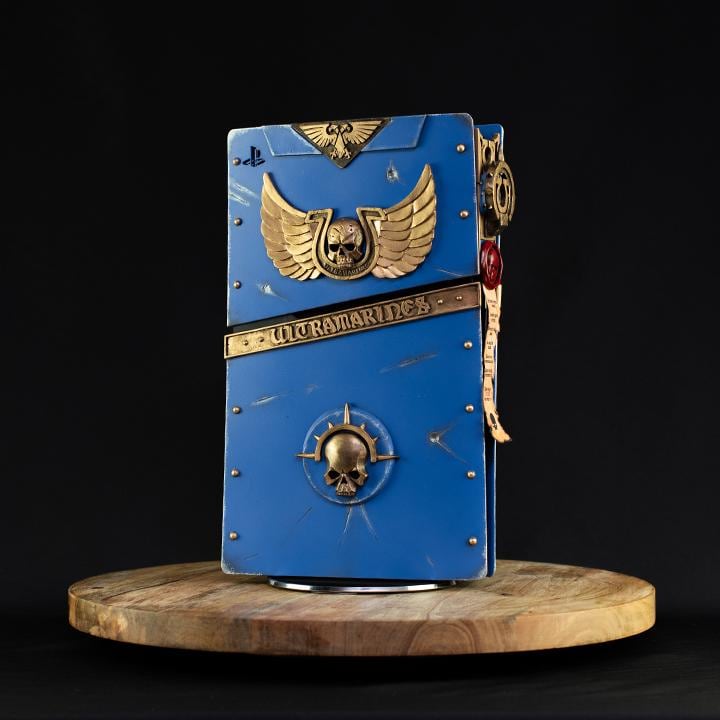 Custom made Warhammer 40,000 Space Marine 2 Ultramarine style PlayStation 5 slim console covers.