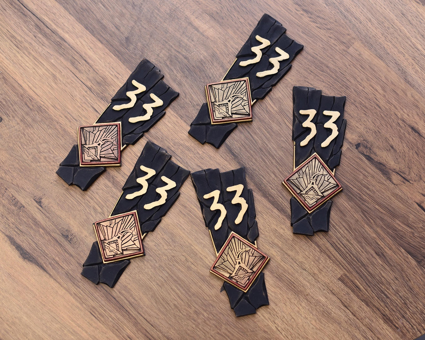 Clair Obscur: Expedition 33 style hand made and painted logo badge/magnet.