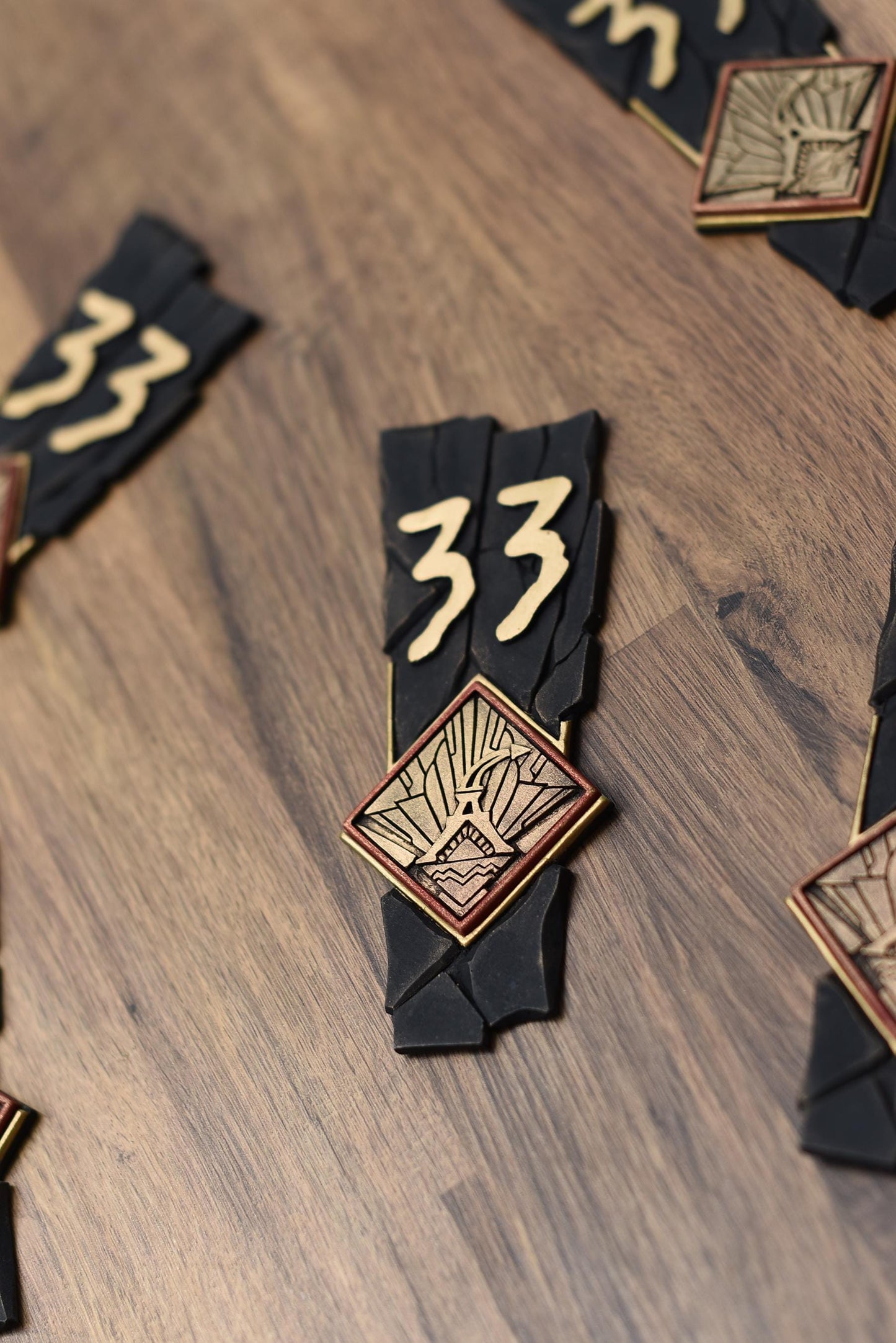 Clair Obscur: Expedition 33 style hand made and painted logo badge/magnet.